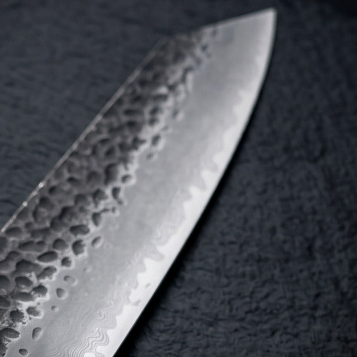 Dos de lame et émouture polie du couteau japonais NAKUMI